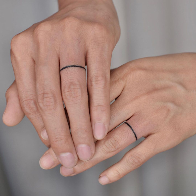 marriage couple ring tattoo