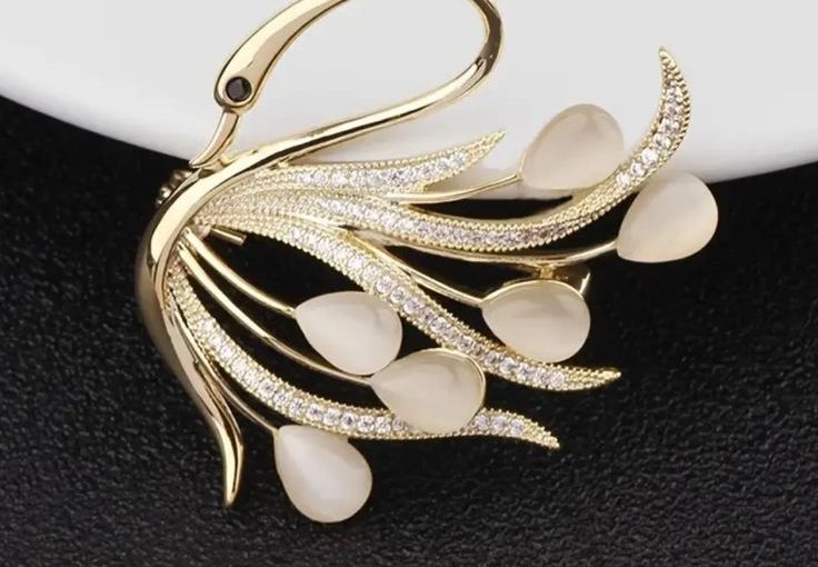 Add Elegance with This Year’s Must-Have Swan Brooch